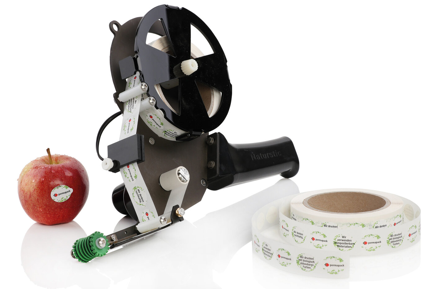 Pomme, distributeur et rouleau avec étiquettes durables pour aliments. 